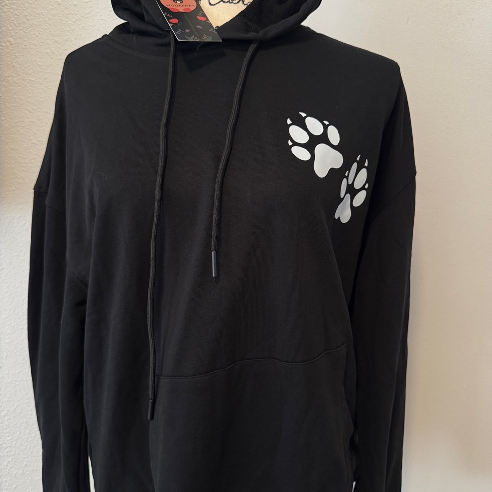 Black sweatshirt with foot print